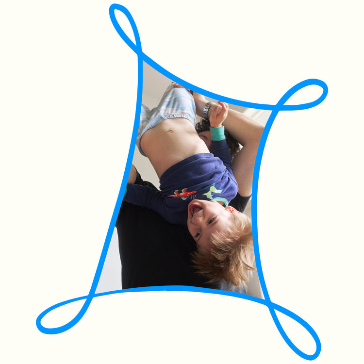 Father lifting his son