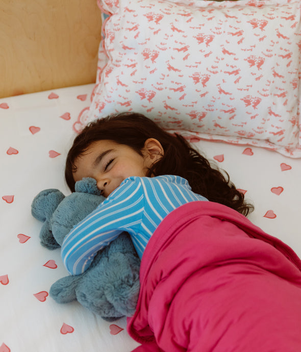 Girl sleeping in crib