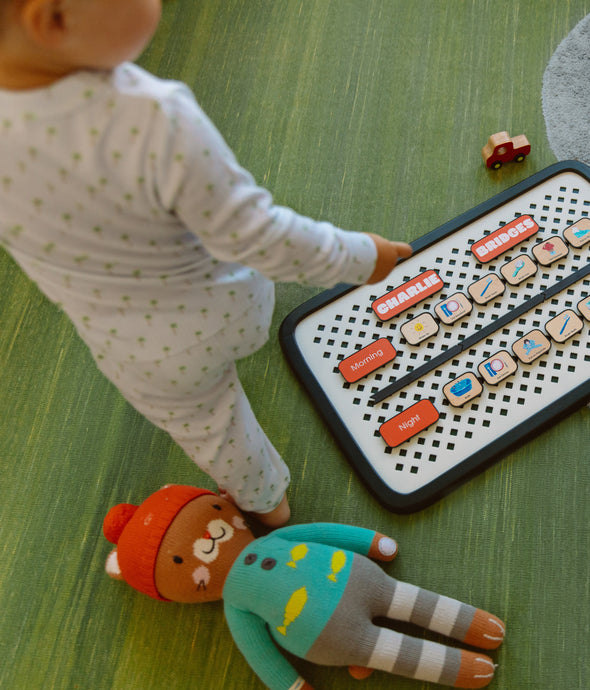 Boy looking down at Small Sprinboard